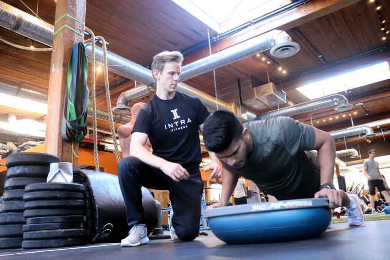 Intra Fitness private personal training Vancouver to boost confidence and personal power